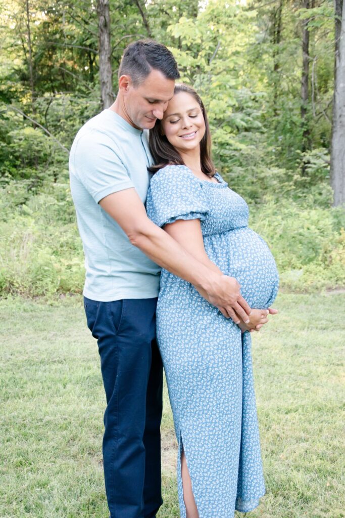 Husband and wife posing for picture.