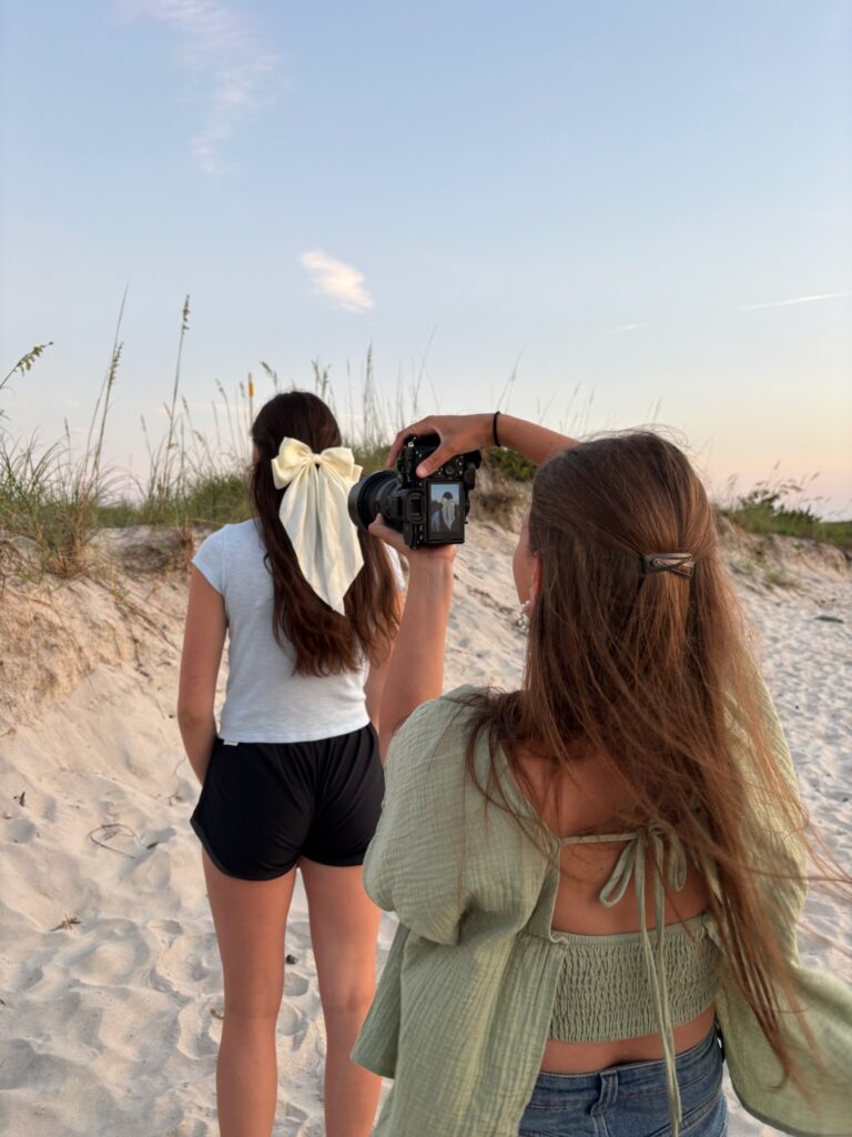 Lizzy Grace Taking a photo of the bows. What to bring to a brand session.