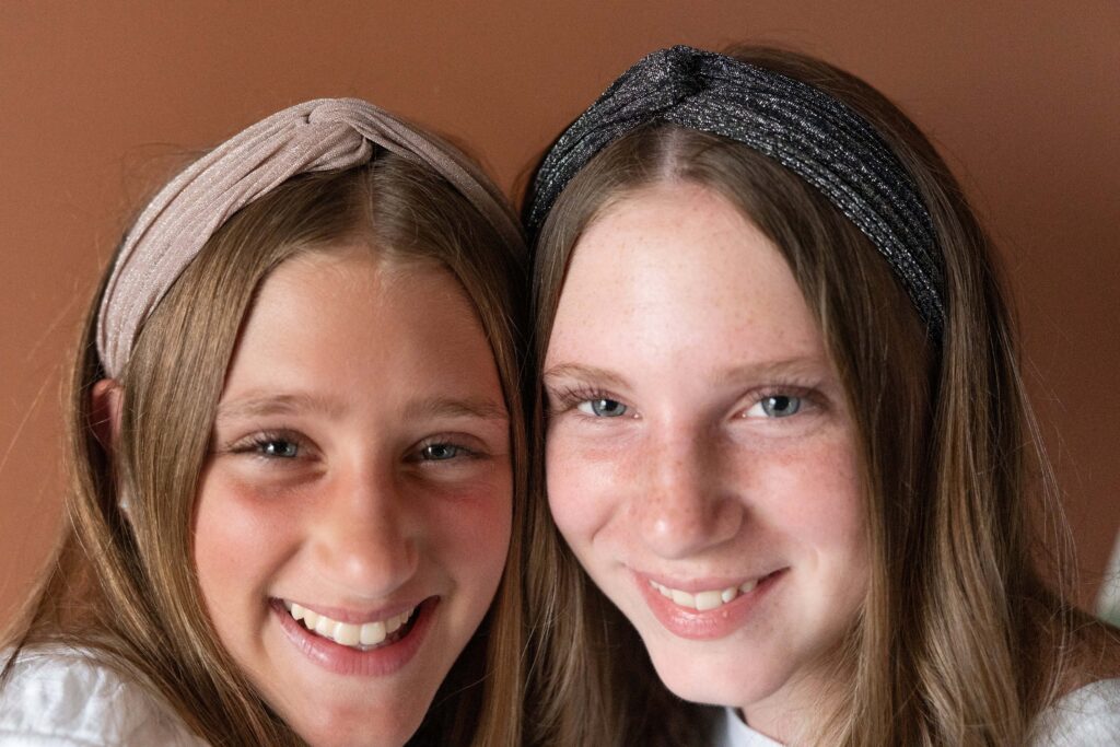 Two sisters wearing 